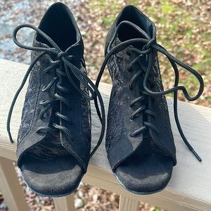 Black lace shoe, size 6.5, never worn.